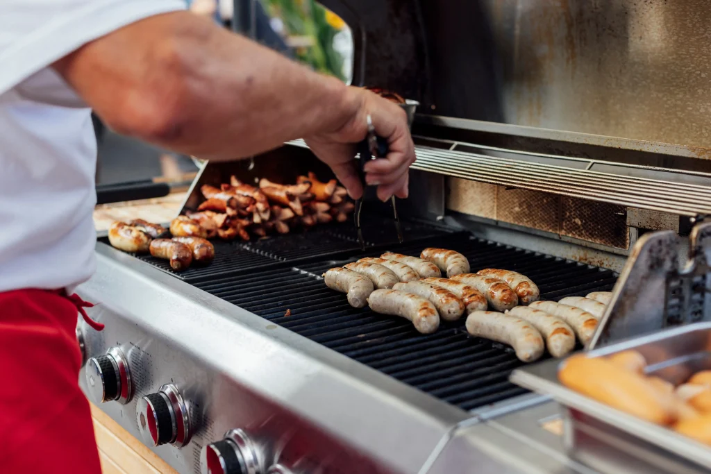 Close-up of sausages on the grill.