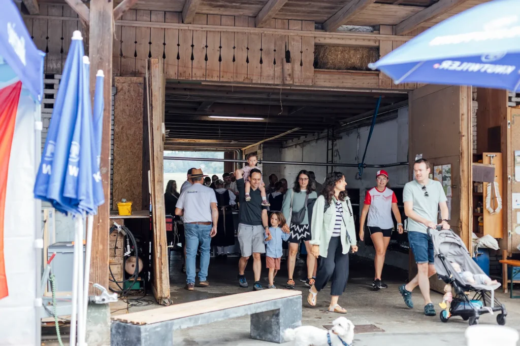 Visitors stroll through the covered farm entrance to the brunch.